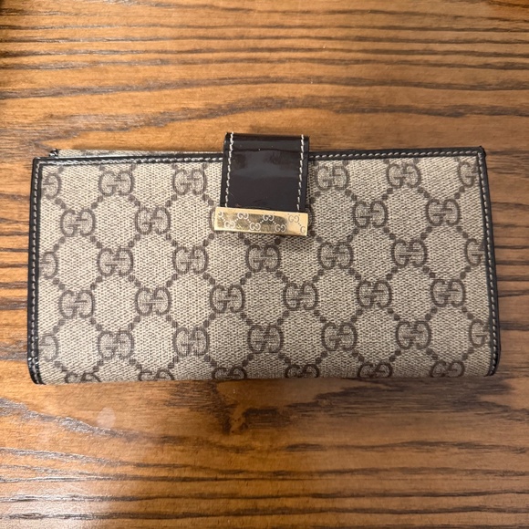 Gucci Handbags - Gucci GG Canvas Leather Wallet